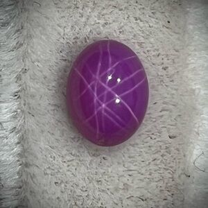 1.8 carat oval shaped linde star ruby